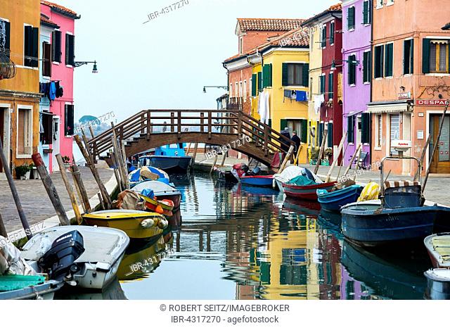 Colorful houses on canal with boats, Burano, Venice, Veneto, Italy