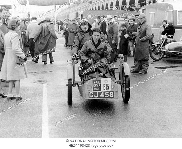 Sammy Davis with 1897 Leon Bollee tricar 'Beelzebub', London to Brighton Run. Davis and his vehicle pictured in Brighton at the finish of the event