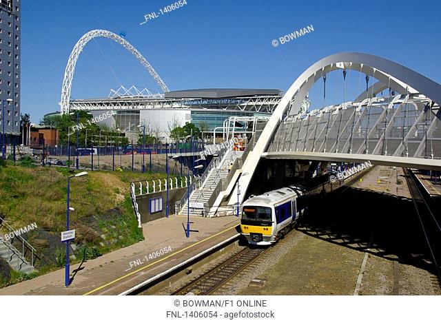 Railway station with stadium in background, Wembley Arena, Wembley Stadium, Wembley, London, England