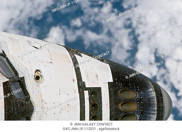 This close-up view of the nose of space shuttle Discovery was provided by an Expedition 26 crew member during a survey of the approaching STS-133 vehicle prior...