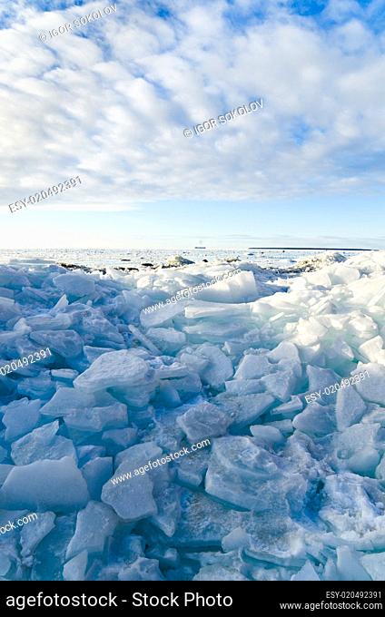 Pile of broken ice floes on the Baltic Sea coast