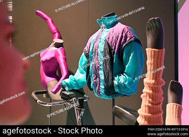 PRODUCTION - 12 June 2023, Baden-Württemberg, Karlsruhe: Exhibits of aerobic and sports fashion from the 1980s are part of the exhibition ""The 80s - They're...