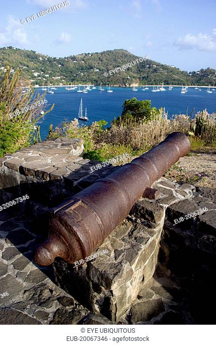 Canon on the 18th Century Hamilton Battery overlooking Admiralty Bay and moored yachts