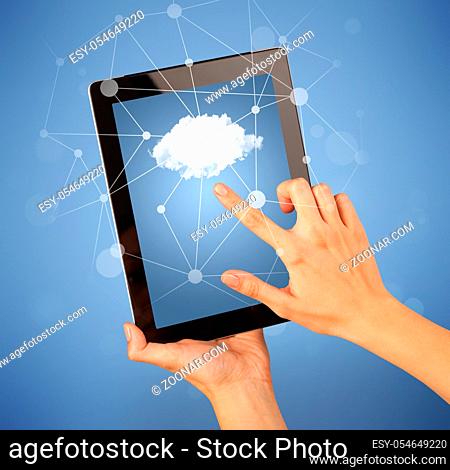 Female fingers touching tablet with cloud concept