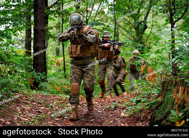 Modern warfare Soldiers Squad Running as Team in Battle Formation