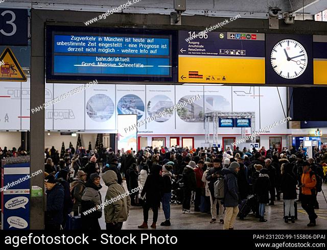 02 December 2023, Bavaria, Munich: A display board at the main station indicates that train services in the greater Munich area have been suspended