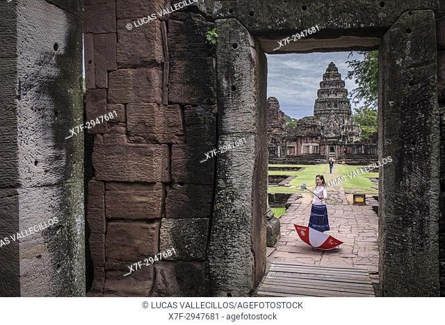 Tourist, Passage way and central sanctuary from Outer Southern Gopura, in Prasat Hin Phimai (Phimai Historical Park), Phimai, Nakhon Ratchasima province
