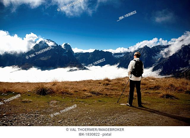 Woman hiking in Drei Zinnen, Tre Cime di Lavaredo area in Dolomite Alps, Southtirol, Italy, Europe