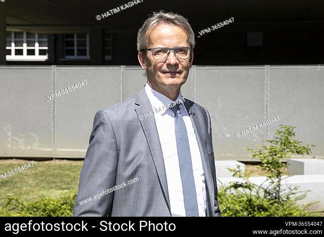 KU Leuven rector Luc Sels poses for the photographer during a ceremony for the unveiling of a glass plate for two former US athletes in marge of tomorrow's...