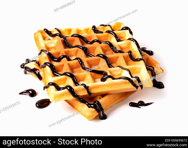viennese waffles with chocolate syrup isolated on white background