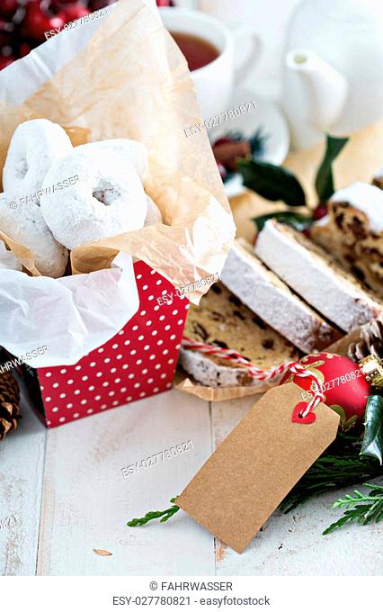 Food gifts donuts and christmas stollen with dried fruits