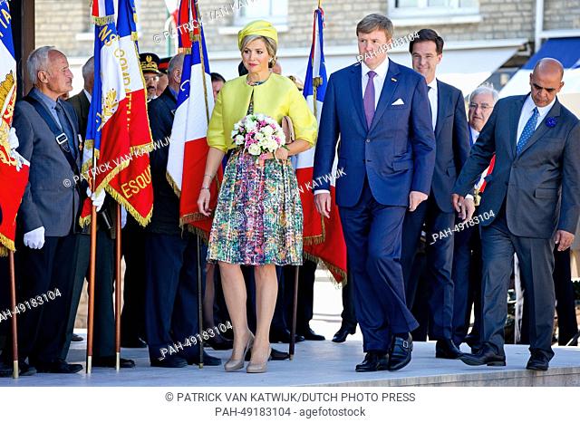 Dutch Prime Minister Mark Rutte (2nd R), Dutch King Willem-Alexander (C) and Queen Maxima attend the D-Day commemoration to mark the 70th anniversary of the...