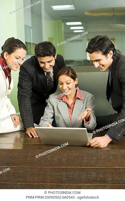 Business executives discussing a project in an office