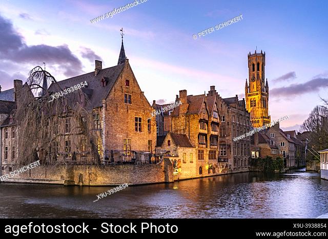 Rozenhoedkaai canal with belfry at dusk, Bruges, Belgium