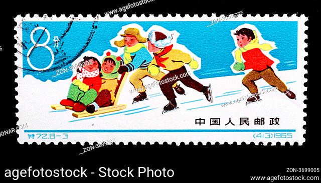 CHINA - CIRCA 1965: A Stamp printed in China shows image of skiing children, circa 1965 CHINA - CIRCA 1965: A Stamp printed in China shows image of skiing...