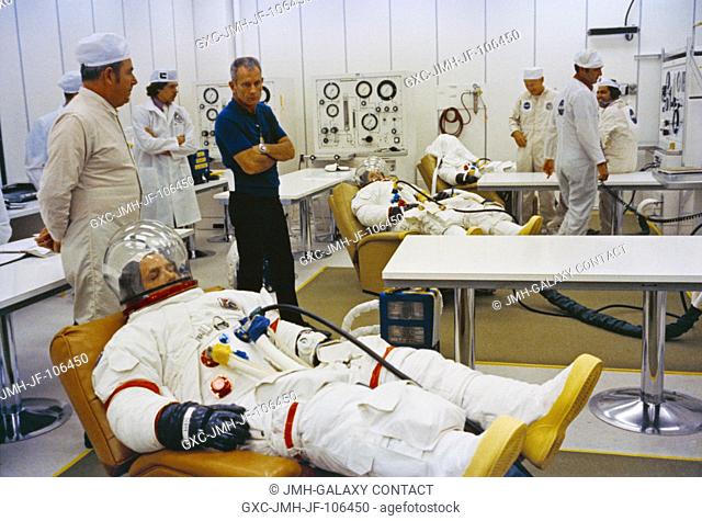 The three Apollo 15 astronauts go through suiting up operations in the Kennedy Space Center's (KSC) Manned Spacecraft Operations Building (MSOB) during the...