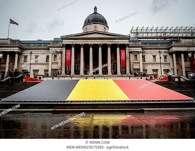 A massive Belgian Flag is placed on the steps leading from to Trafalgar Square up to the National Portrait Gallery in London