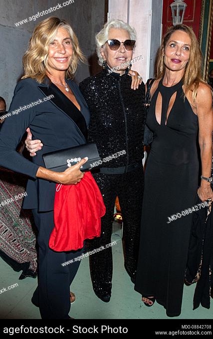 Italian designer Chiara Boni with the journalist Mirta Merlino and a guest on the occasion of the party for her 50 years of activity