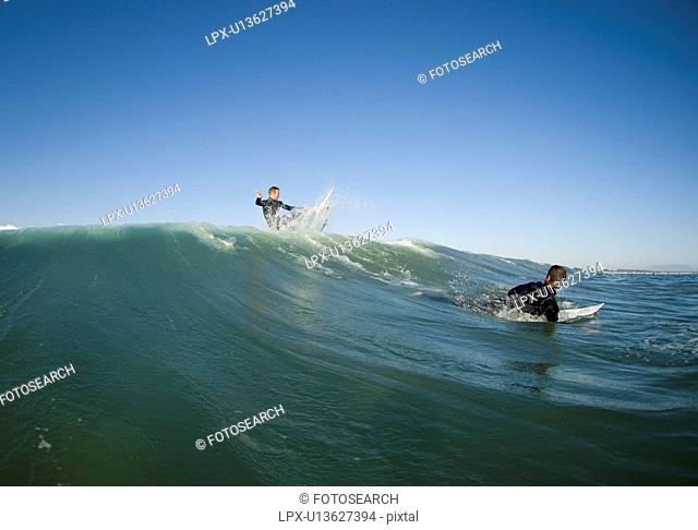 Two surfers