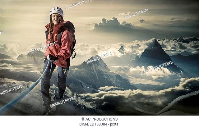 Caucasian hiker climbing mountain, Monte Rosa, Alps, Italy