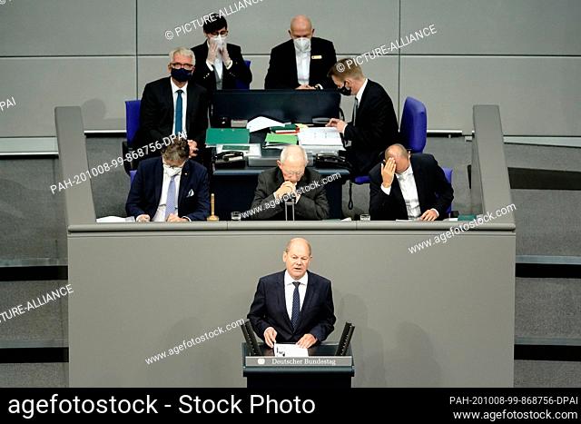 08 October 2020, Berlin: Olaf Scholz (M, SPD), Federal Minister of Finance, speaks in the plenary session of the Bundestag