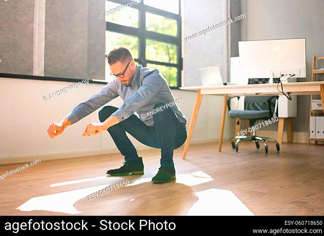 Workplace Exercise At Office Desk. Fit Man Doing Sit Up