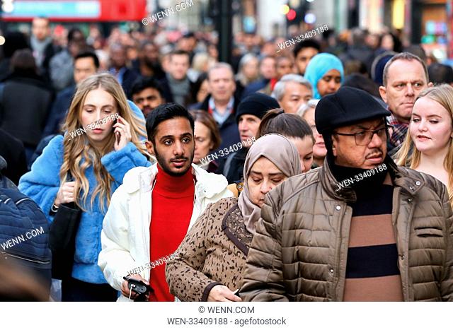Black Friday on Oxford Street in London Tens of thousands of shoppers take advantage of Black Friday deals. Black Friday is a sales offer originating from the...