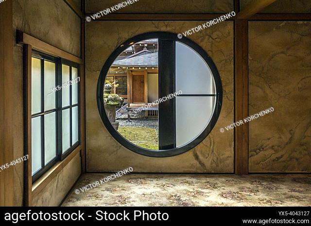 Courtyard seen through the round window in Tamozawa Imperial villa