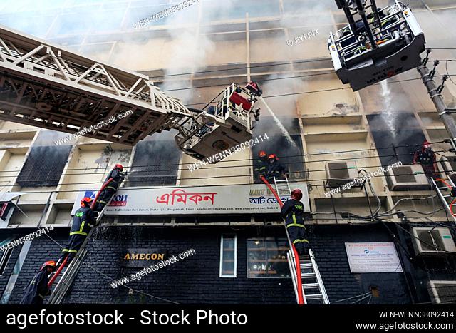 Firefighters are seen during the fire that broke out in a commercial building in Banani Chairmanbari on August 21st 2021 in Dhaka, Bangladesh