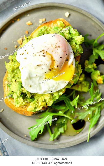 Avocado and a poached egg on toast