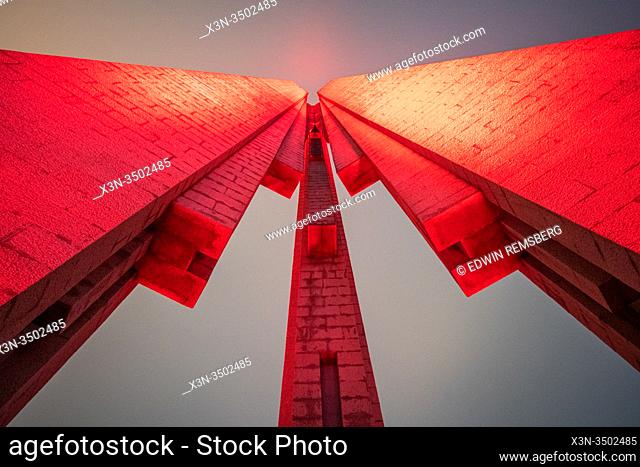 The vibrantly lit Monument to the People's Heroes in Shanghai, China