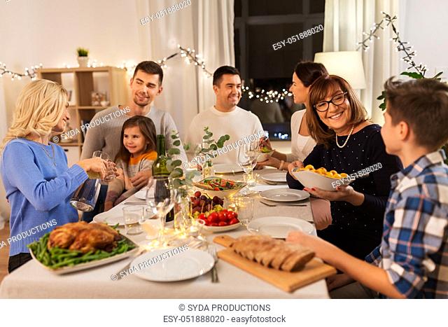 happy family having dinner party at home