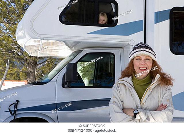 Portrait of a mature woman and her daughter in a recreational vehicle
