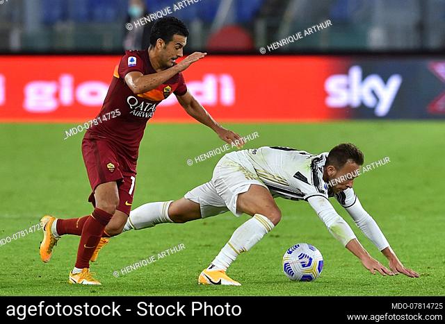 Juventus football player Henrique Arthur and Roma football player Pedro Rodriguez during the match Roma-Juventus in the Olimpic stadium