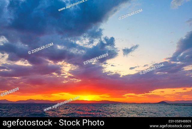 Beautiful sundown over the sea with glowing sky -- Sunset seascape / landscape with space for your own text