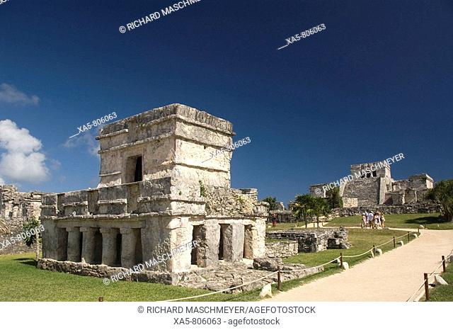 Mexico, Quintana Roo, Tulum, Temple of the Frescoes (foreground), El Castillo (background)