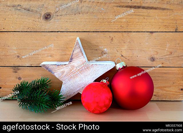 A typical Christmas symbols decoration on a wooden background