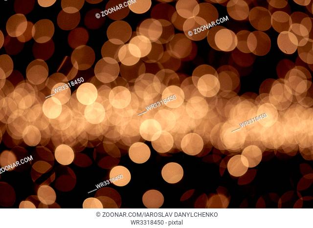 abstract golden background of christmas lights. bokeh background