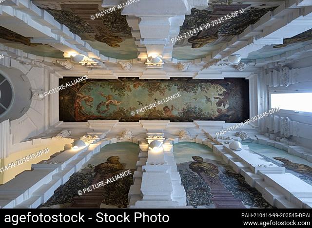09 April 2021, Saxony-Anhalt, Magdeburg: This staircase with ceiling paintings and abundant stucco on the walls is located at Hegelstraße 16