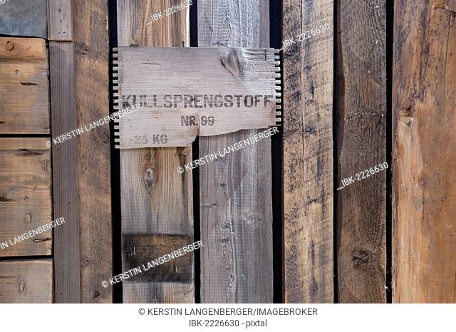 Old wooden planks, part of an explosives' crate, wall decorations, Basecamp Trapper's Hotel, Longyearbyen, Spitsbergen, Svalbard, Norway, Europe