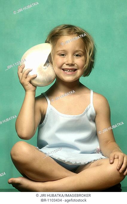 Portrait of a girl with scallop