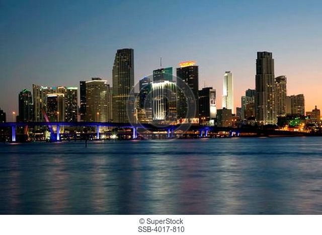 Downtown Miami Skyline and Port Boulevard bridge from across the Intracoastal Waterway at dusk