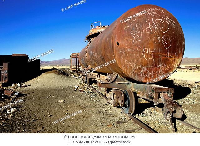 Rusting old railway tanker at the train cemetery in Uyuni in Southwest Bolivia