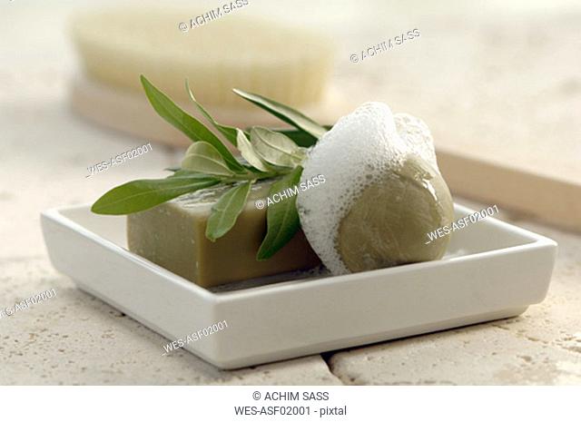 Soaps with herbal leaf on soap dish