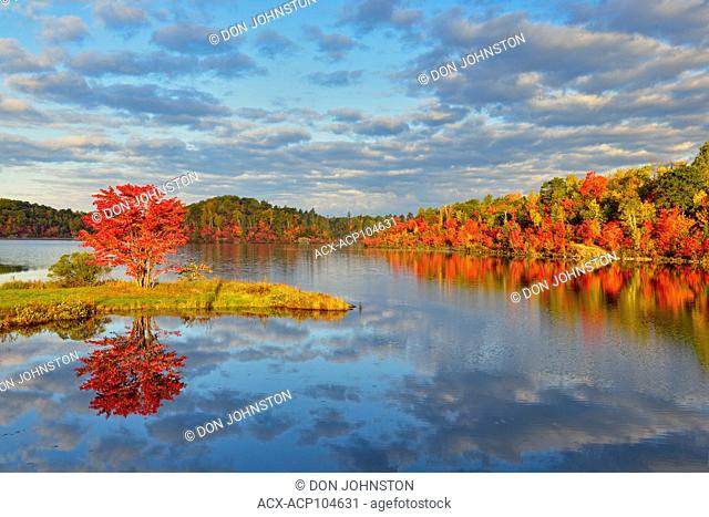 Autumn reflections in St. Pothier Lake, Greater Sudbury, Ontario, Canada