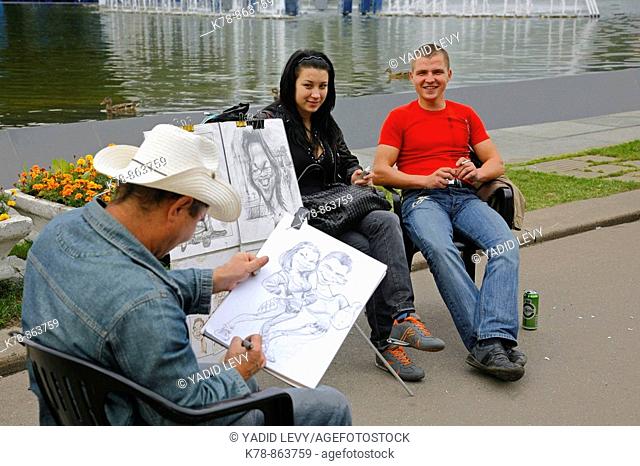Sep 2008 - Young couple having their portrait at painted at Gorky Park, Moscow, Russia