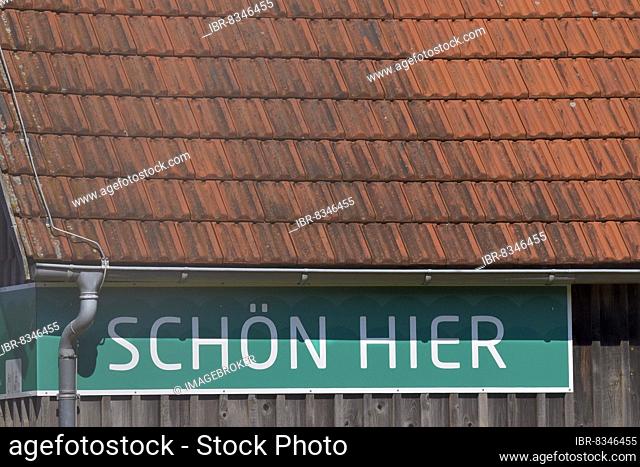 Sign with inscription Schön hier unter Hausdach, Hessenpark, Neu-Anspach, Hesse, Germany, Europe