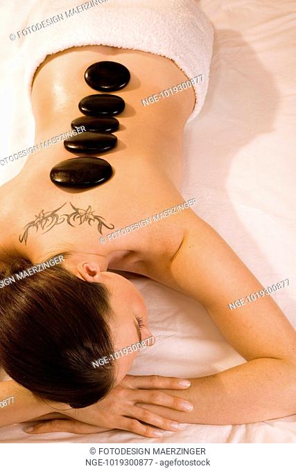 Young Woman Receiving LaStone Therapy
