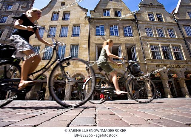 Cyclists on Prinzipalmarkt, Muenster, North Rhine-Westphalia, Germany, Europe
