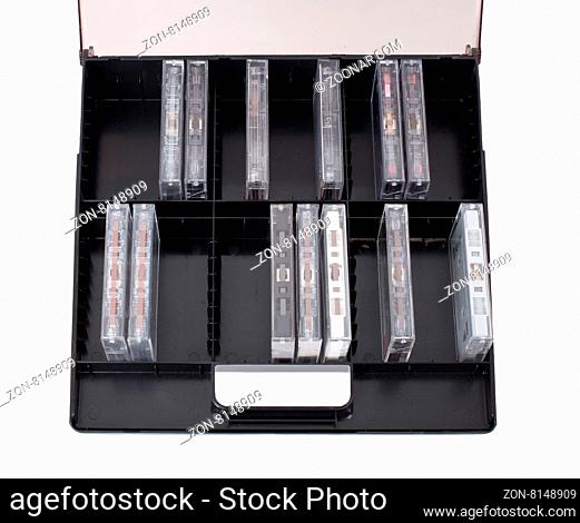 Collection of various vintage audio tapes in a box